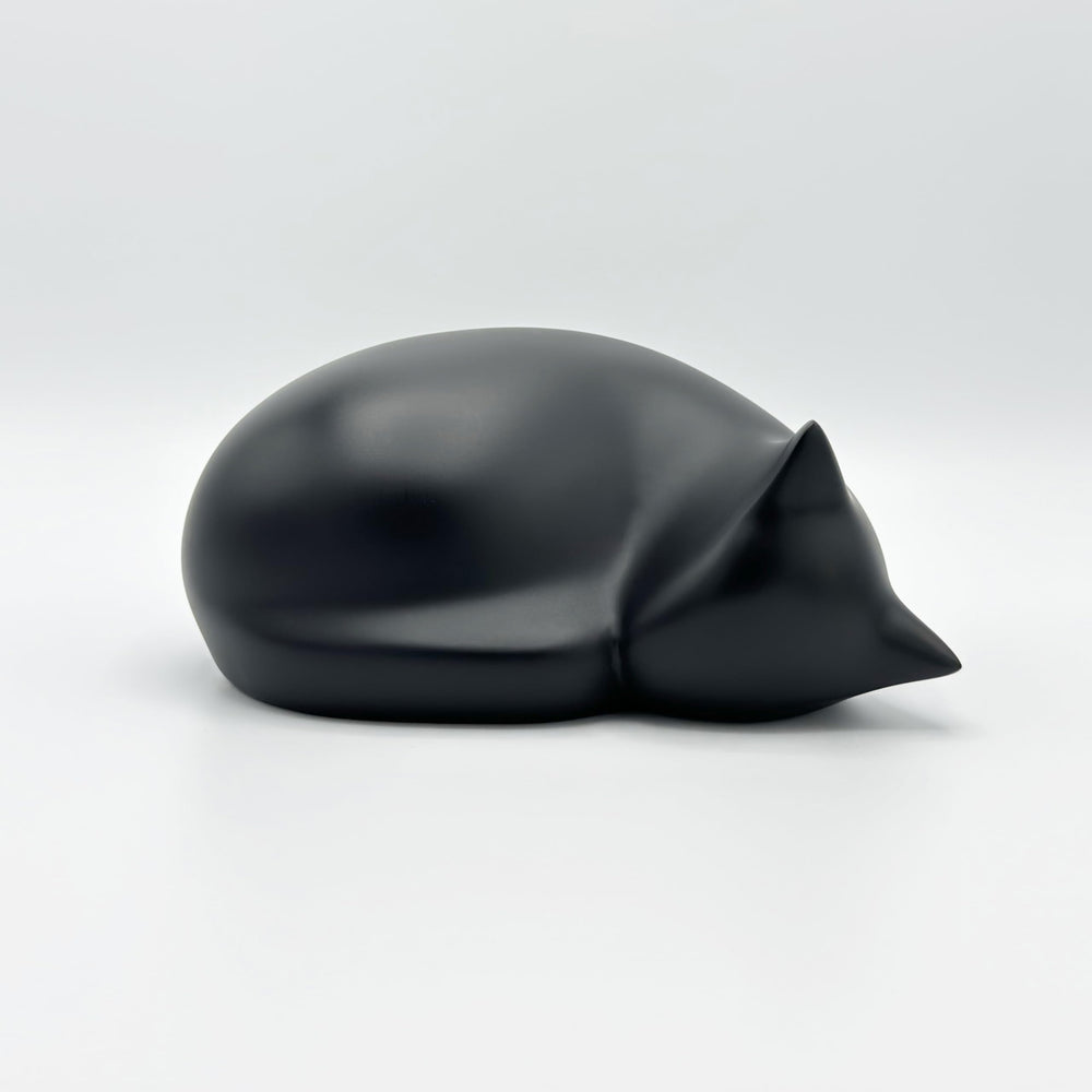 Comemori sleeping cat urn black packaging, protective shipping for safe arrival
