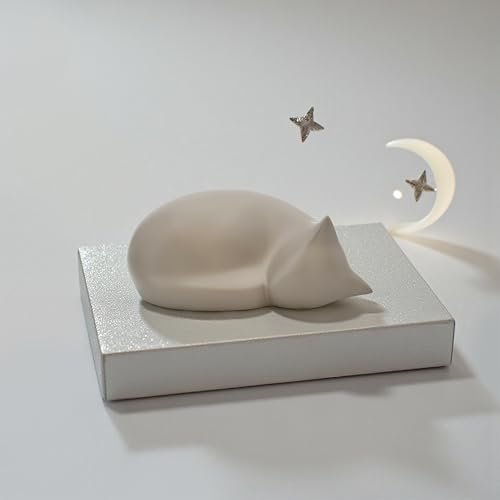 Comemori sleeping cat urn side view in light taupe ideal for serene memory corner