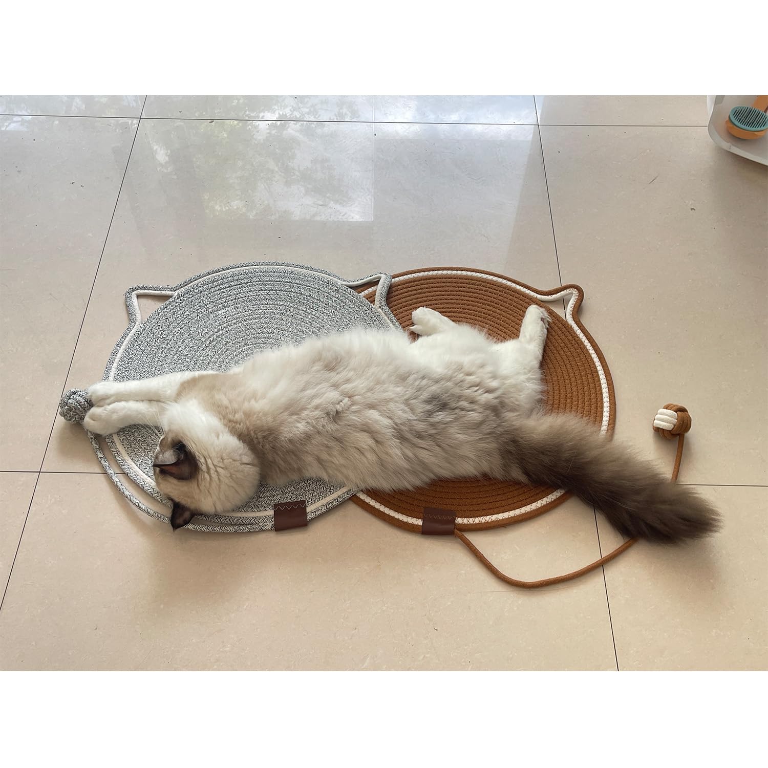 CoveCozy mat includes cat ball toy for interactive play with your cat.