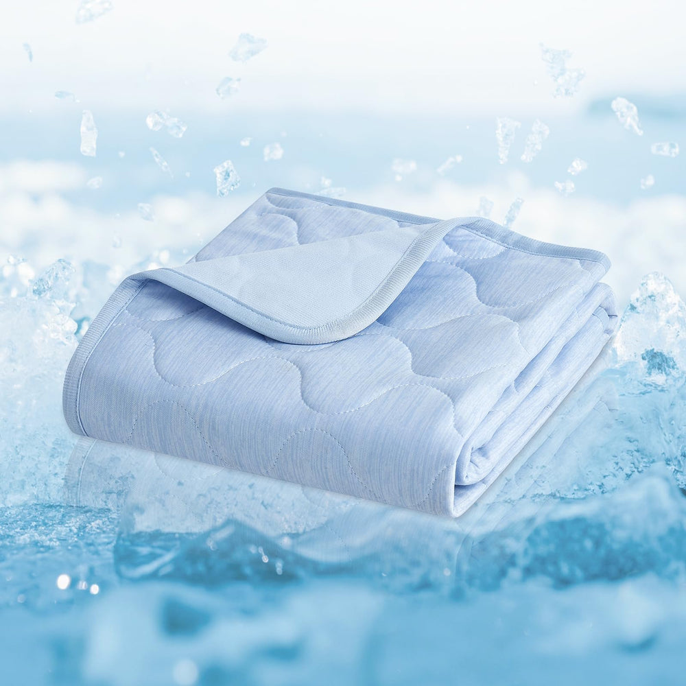 Cozy Bliss leakproof cooling blanket demonstrates furniture protection with rapid cooling for hot days.
