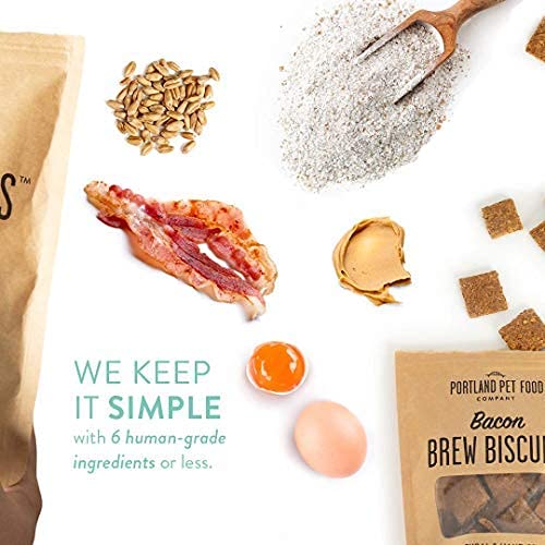 Crafted by Humans Brew Biscuit bacon flavor texture on paw, easy-to-break for seniors or puppies.