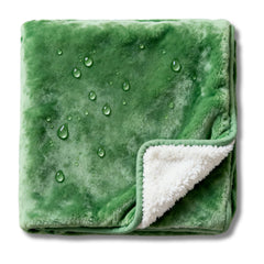 CREW FLX waterproof blanket on bed showing 40x60 coverage for naps and movie nights
