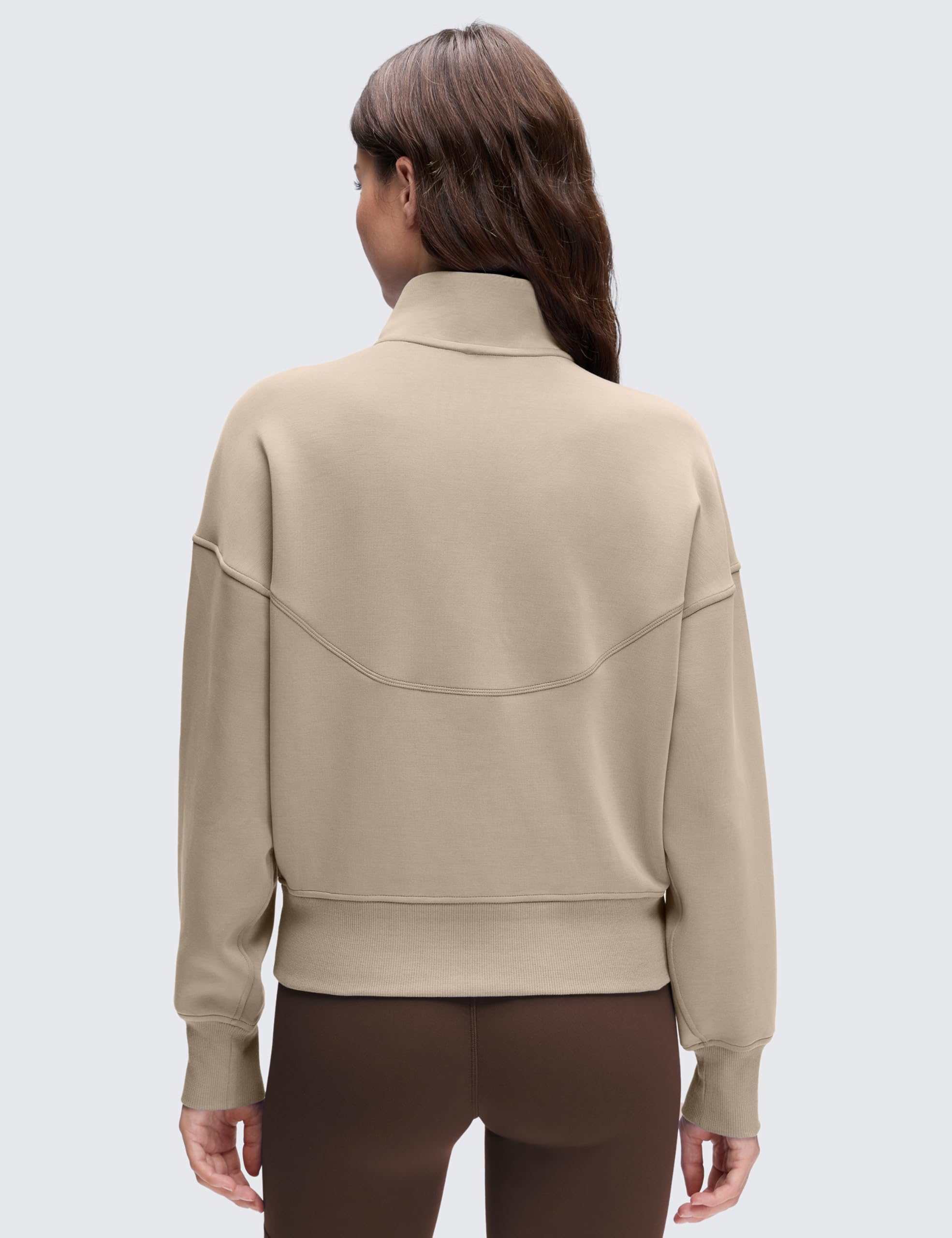 CRZ YOGA SoftAura funnel neck close-up showing plush peach fuzz texture for warmth