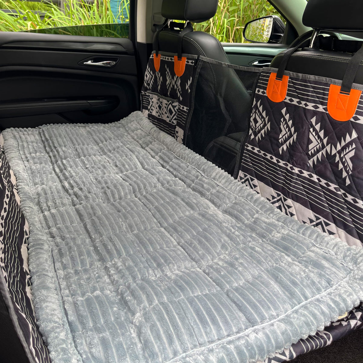 Cshionary dog car seat cover shows back-seat extender compatibility and seat protection.