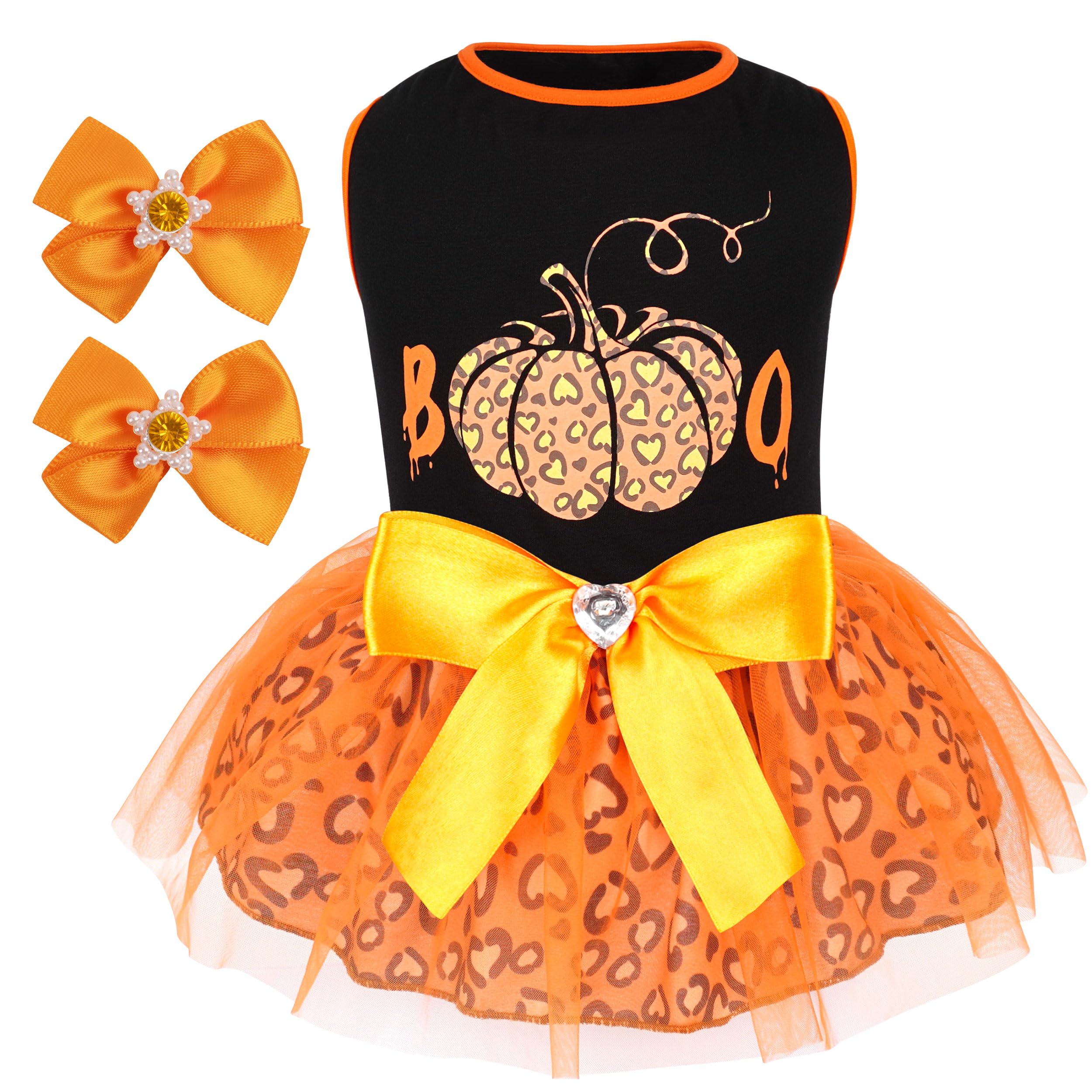 Cyeollo dog dress on model shows plaid with gold bow for holiday style.