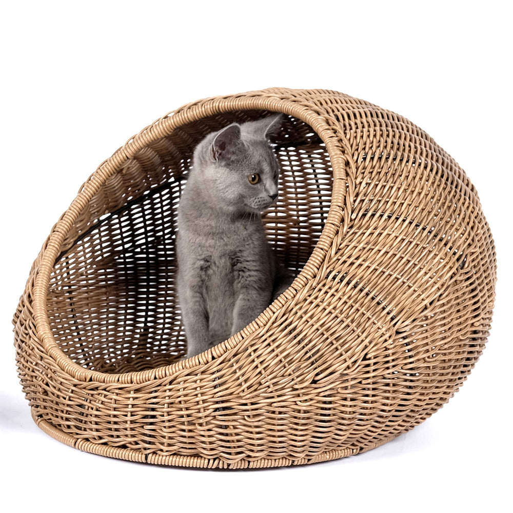 D+GARDEN wicker cat bed dome hooded rim provides shelter.