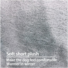 Grey fabric closeup shows durable Oxford material and stitching