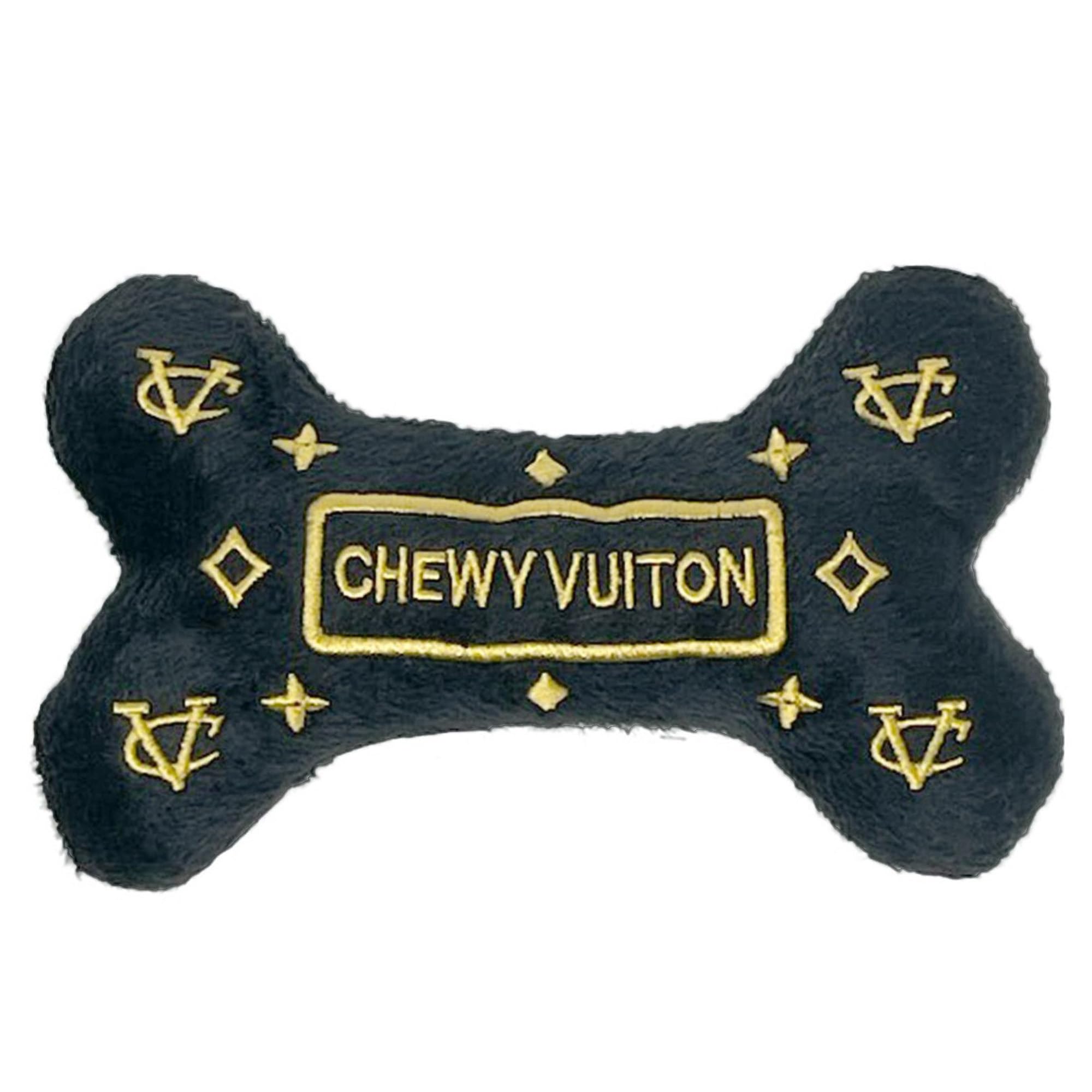 Dog Diggin Designs Runway Pup bone toy with bold colors and squeaker for interactive play.
