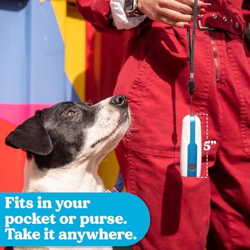 Doggie Don’t anti barking device wrist-strap image demonstrates secure carry during outdoor training