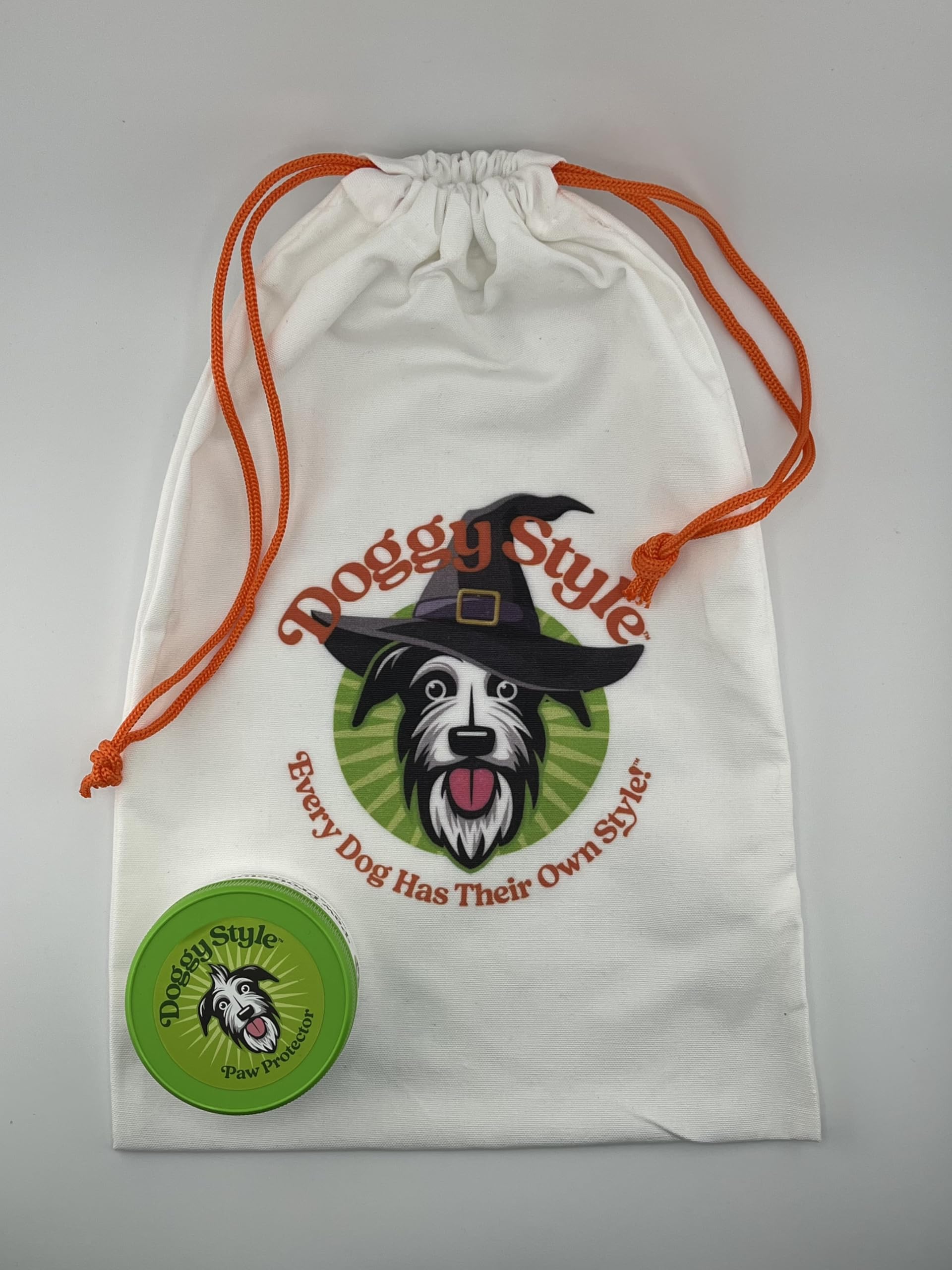 Applying Doggy Style paw balm to pads demonstrates quick-absorbing, non-greasy moisturization