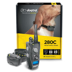 Dogtra 280C waterproof e-collar close-up showing rugged outdoor training readiness.
