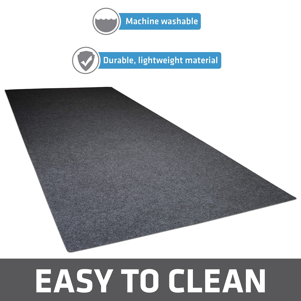 Drymate mat being cut to fit a whelping box.
