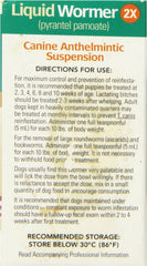 Durvet 2X Liquid Wormer being administered to a dog highlighting palatable flavor
