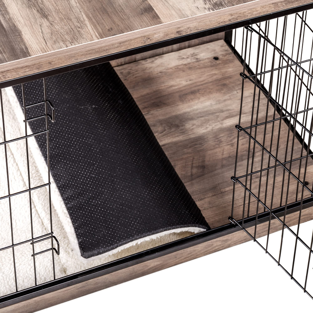 Dwanton dog crate top doubles as a side table for decor.