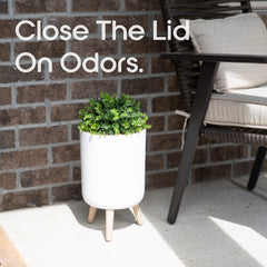 Earth & Mango push-top lid seals odors, keeping yard fresh.