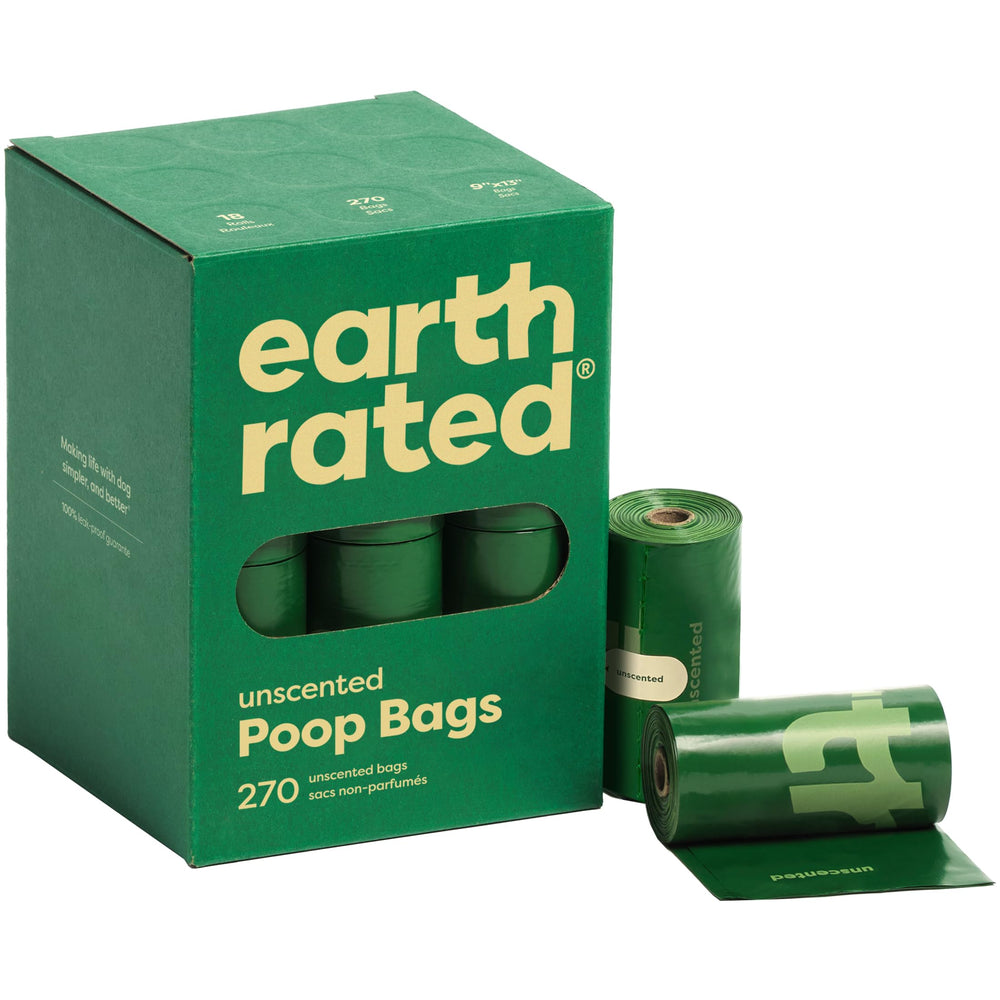 Earth Rated poop bags on a dog walk, leak-proof protection for messes.