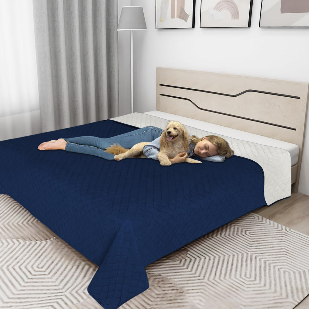 Easy-Going reversible navy and ivory couch cover shows two-color option for style.