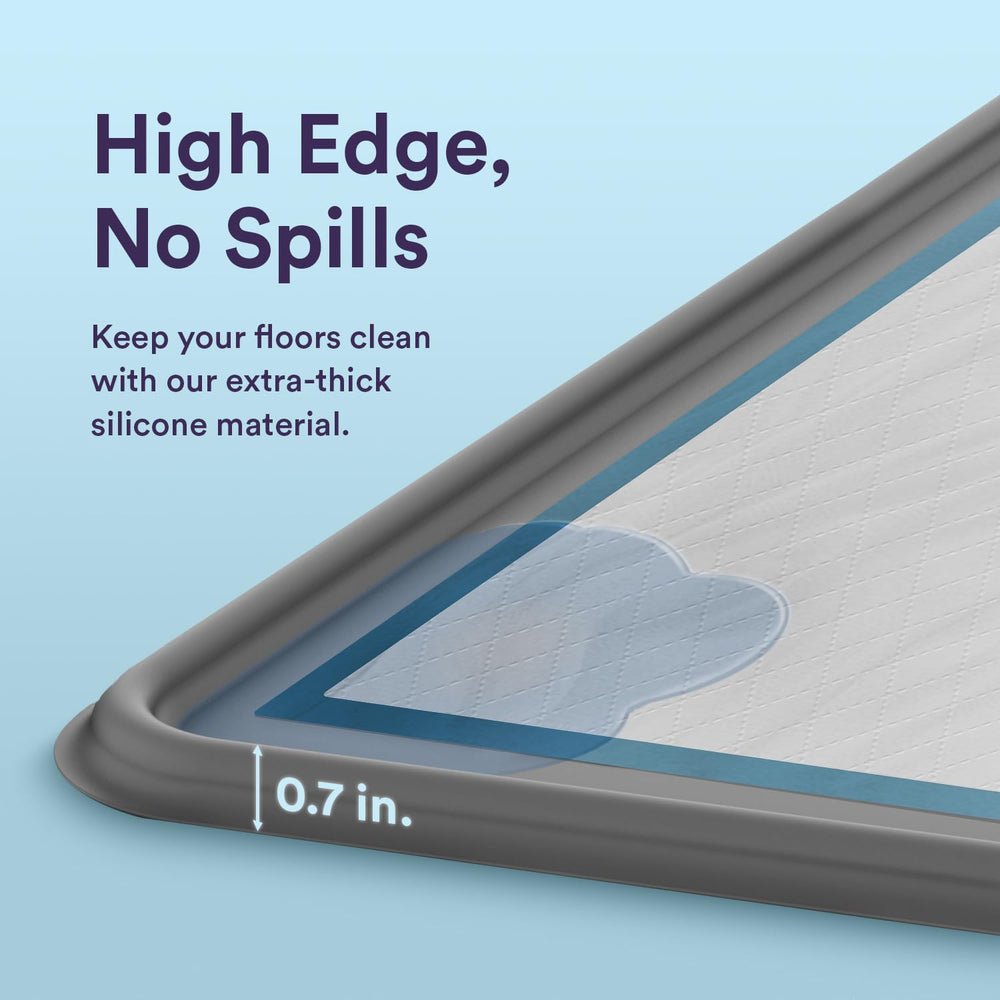 eenk Pee Pad Tray Holder in use to prevent leaks and keep floors dry.