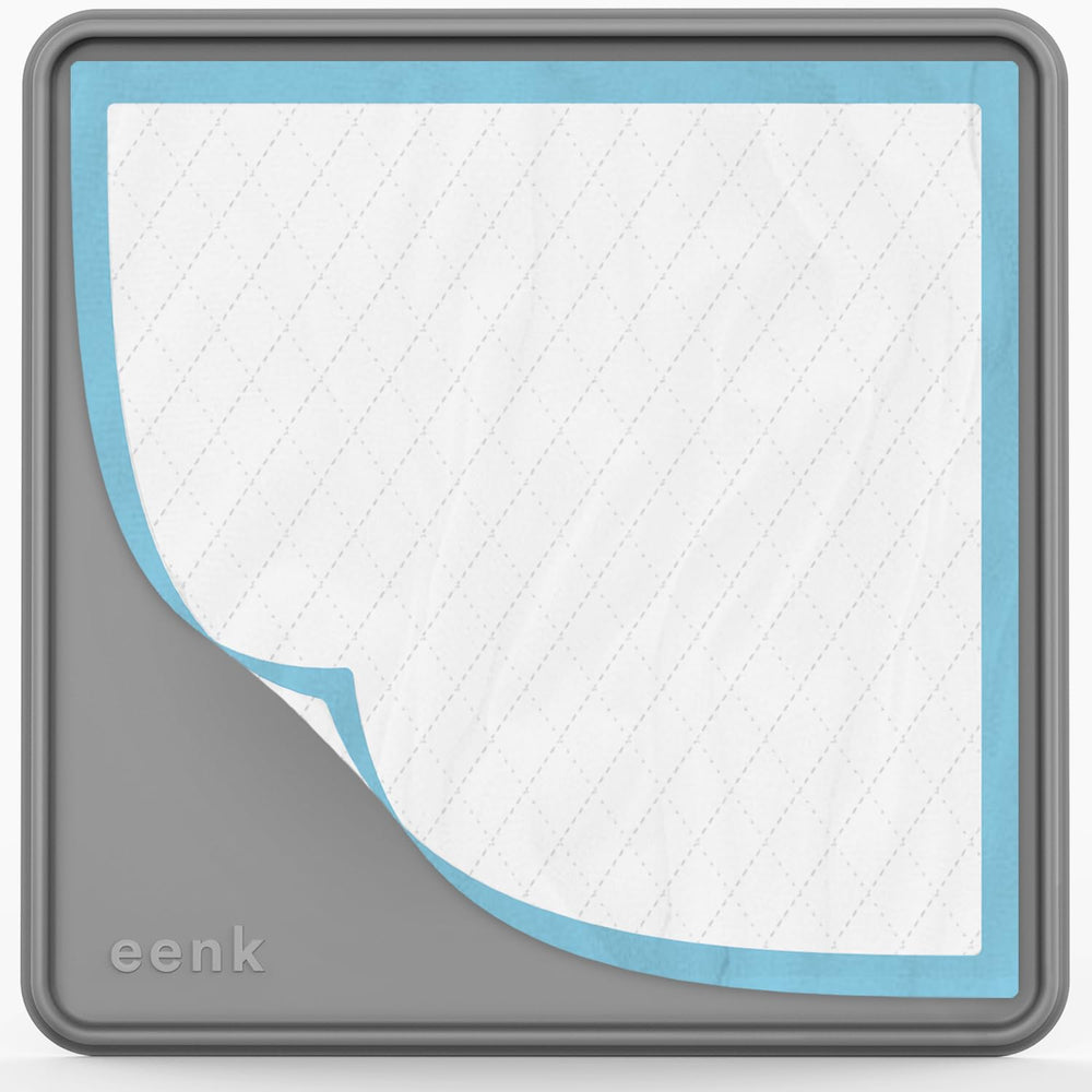 eenk Pee Pad Tray Holder with raised lip protects floors during puppy training.