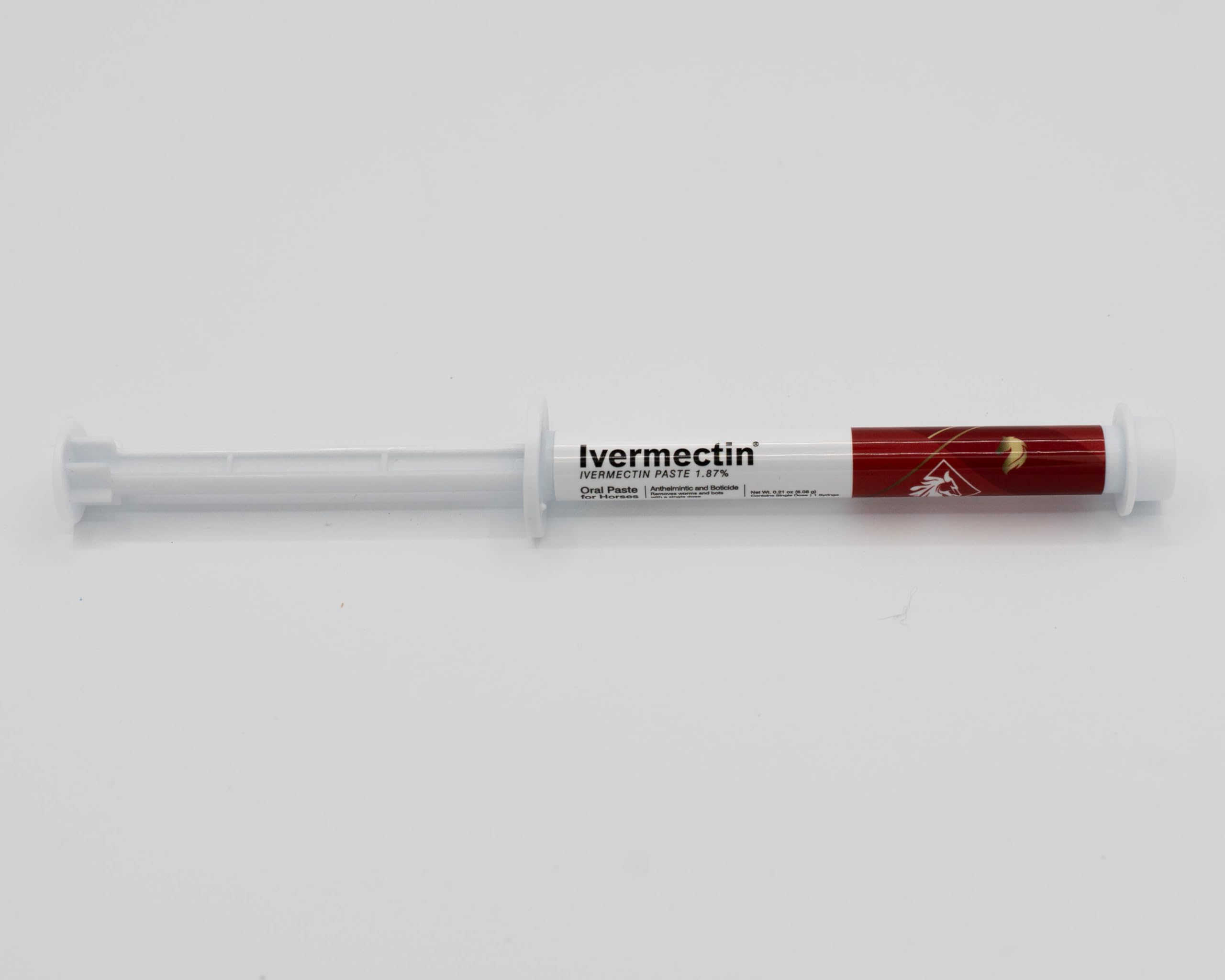 Equine Prime ivermectin usage scene — routine administration in barn setting.
