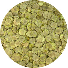 Exotic Nutrition green pea flakes close-up texture—crisp, crunchy bite enrichment.