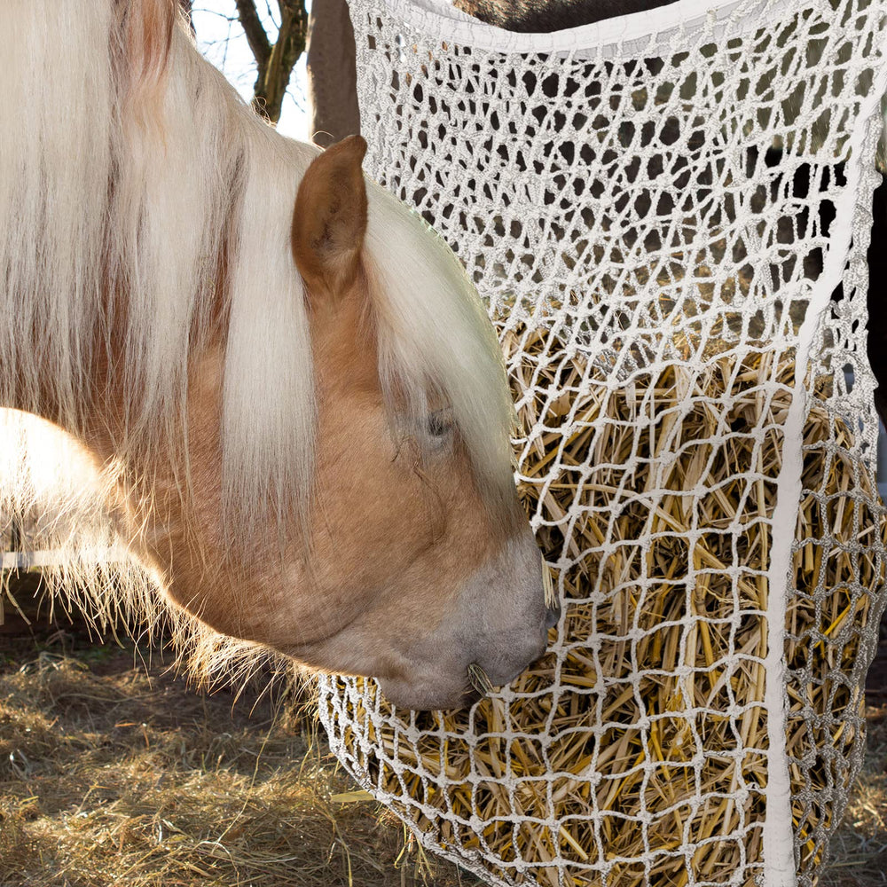Fabbay easy fill hay net with side loops for quick suspension.