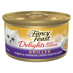 Fancy Feast Delights close-up can shows grilled turkey and cheddar for enticing mealtime flavor.