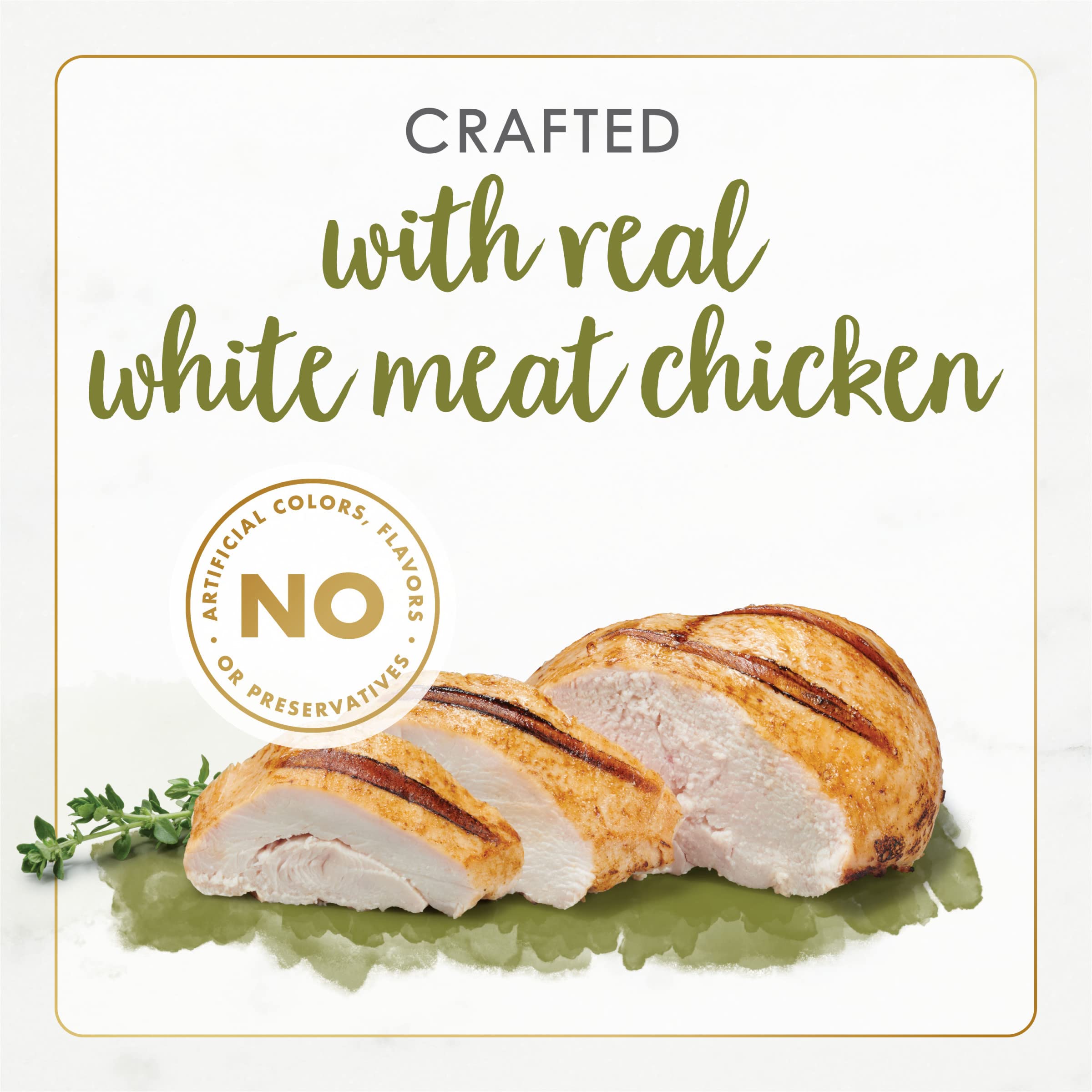 Fancy Feast Gourmet Naturals white meat chicken in gravy being served in bowl—easy eating.