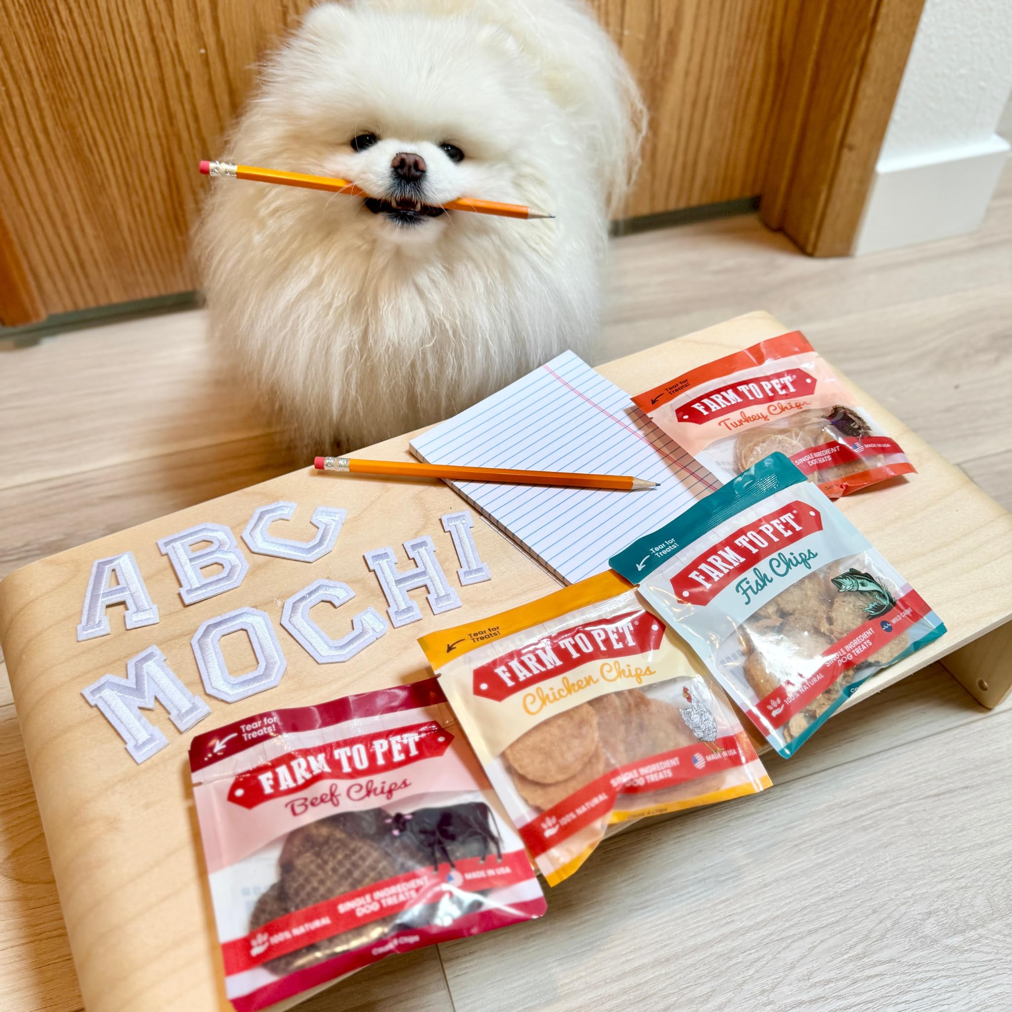 Farm To Pet fish chips product shot showing walleye option and omega-3 for healthy coats