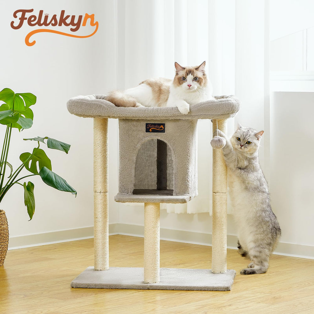 Feliskyn cat tree anti-tip base keeps the unit stable during playful sessions.