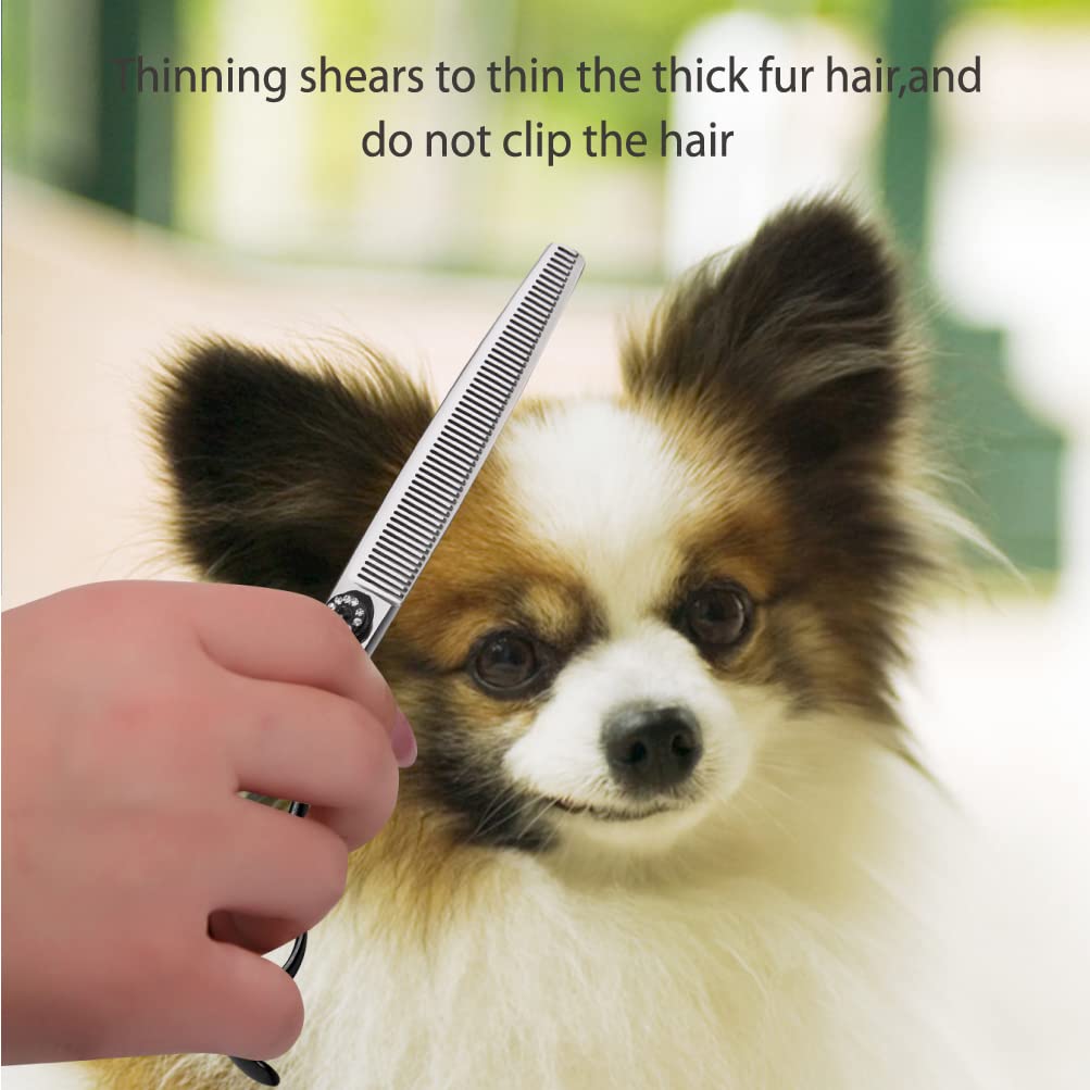 Ergonomic black handle on Fenice Peak scissors for comfortable grooming sessions.