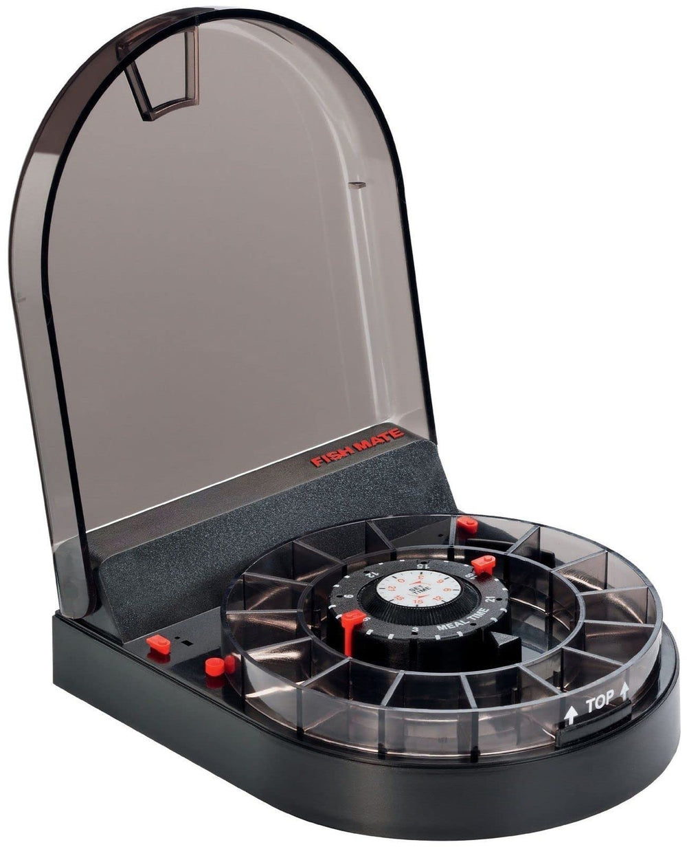 Fish Mate F14 feeder mounted on aquarium hood for precise timed meals.
