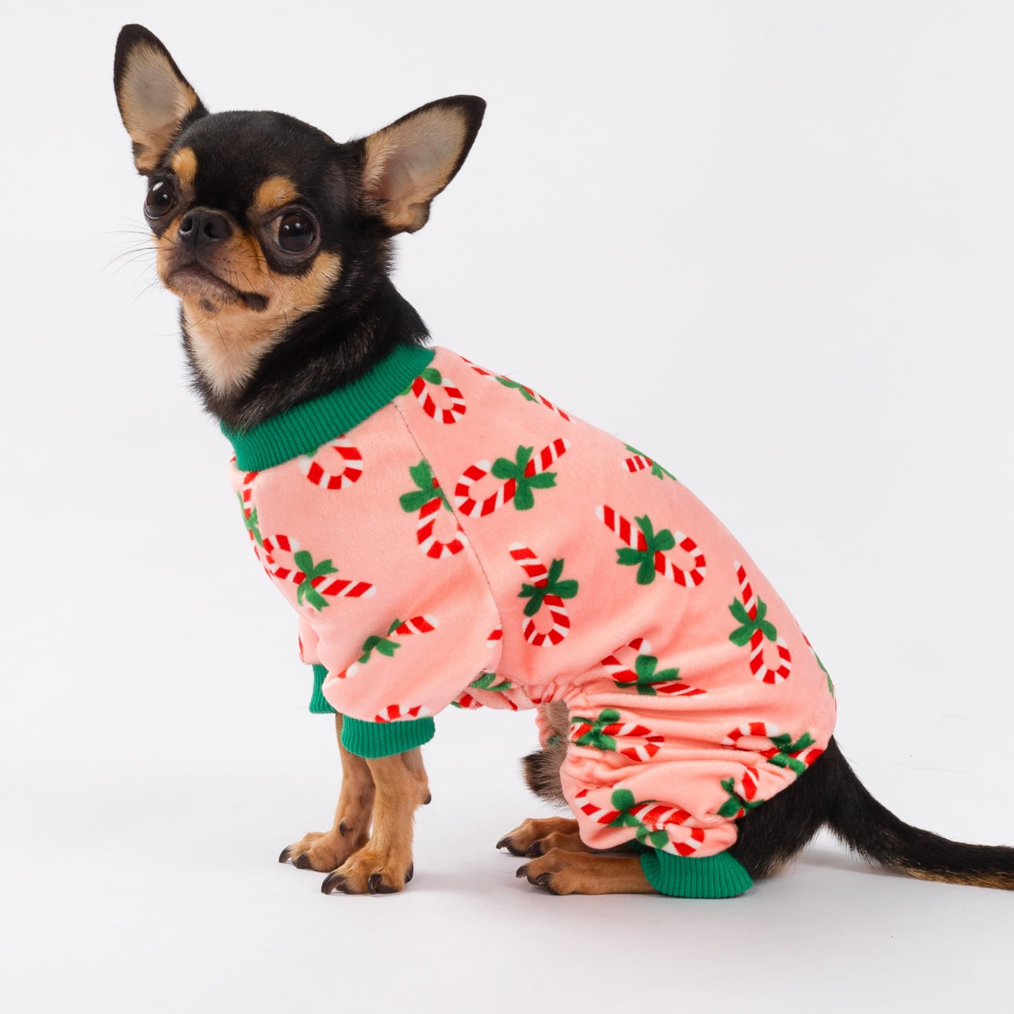 Fitwarm Candy Cane Dog Pajamas side view shows stretchy fabric for easy movement during walks.