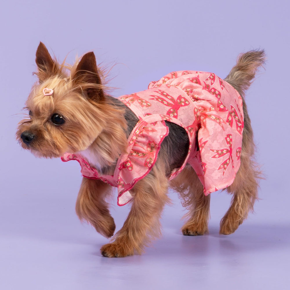 Fitwarm closeup fabric detail on pink dress emphasizes soft polyester, easy movement.