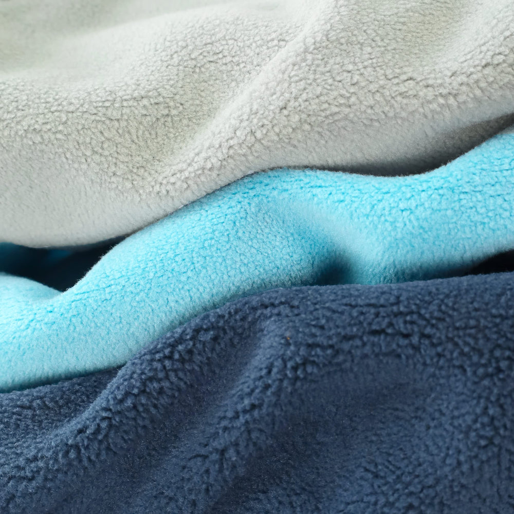 Fitwarm color-variation blue grey navy model demonstrates versatile winter outfits.