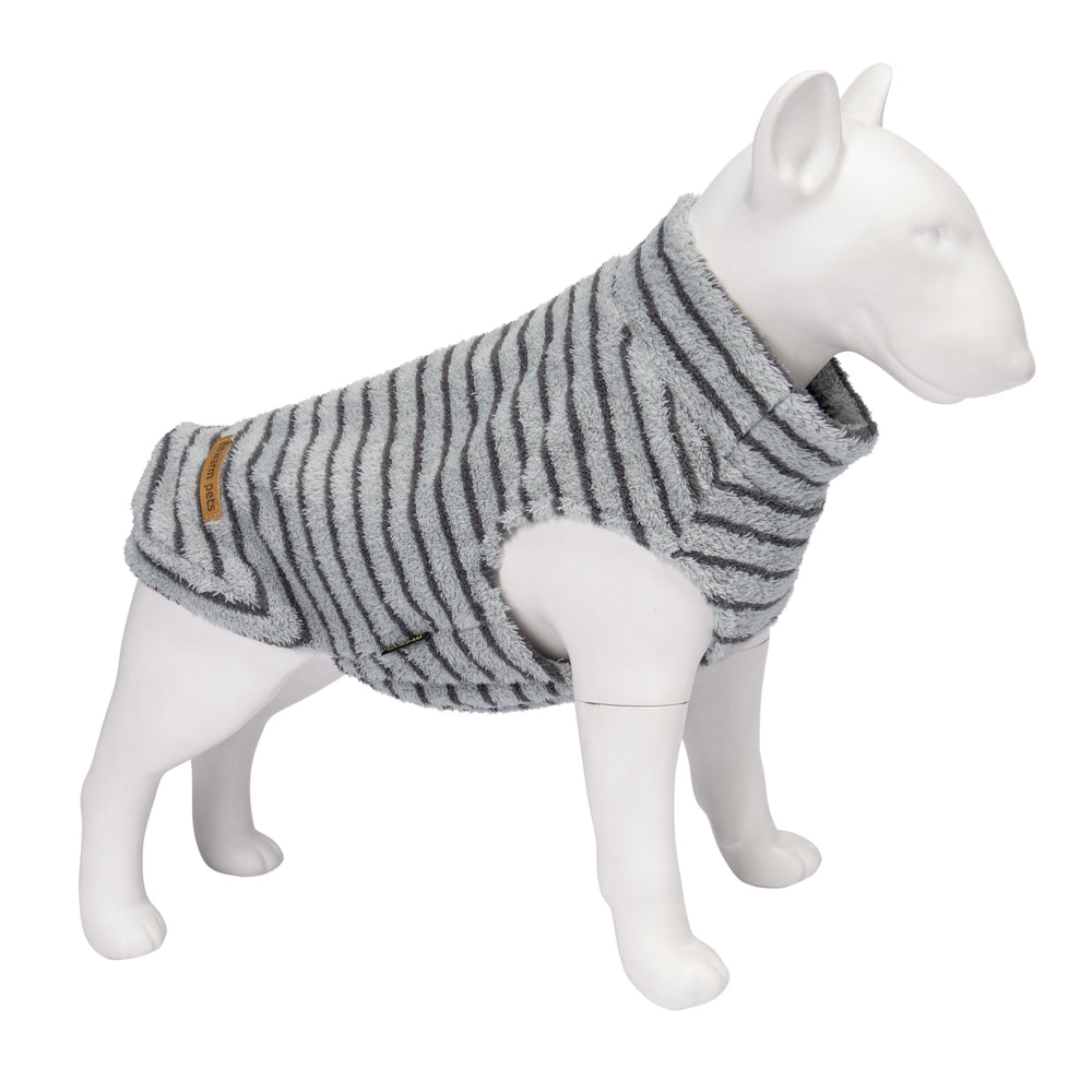 Fitwarm model wearing sweater during winter walk demonstrates versatile use.