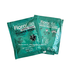 Floral Supply Floralife Crystal Clear packets close up dissolving in water for fresh cuts