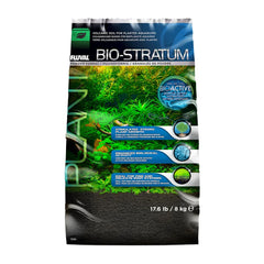 Fluval Bio-Stratum powder poured into a planted aquarium for robust root growth.