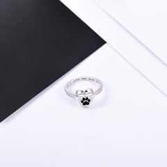 Fookduoduo screw-detail on paw print urn ring indicating secure design.