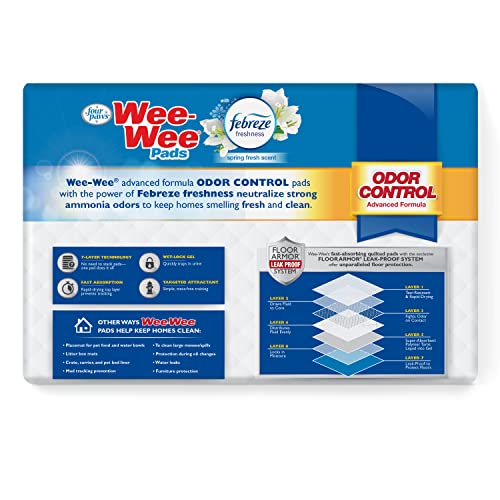 Four Paws Wee-Wee odor-control pad closeup showing 7-layer moisture core