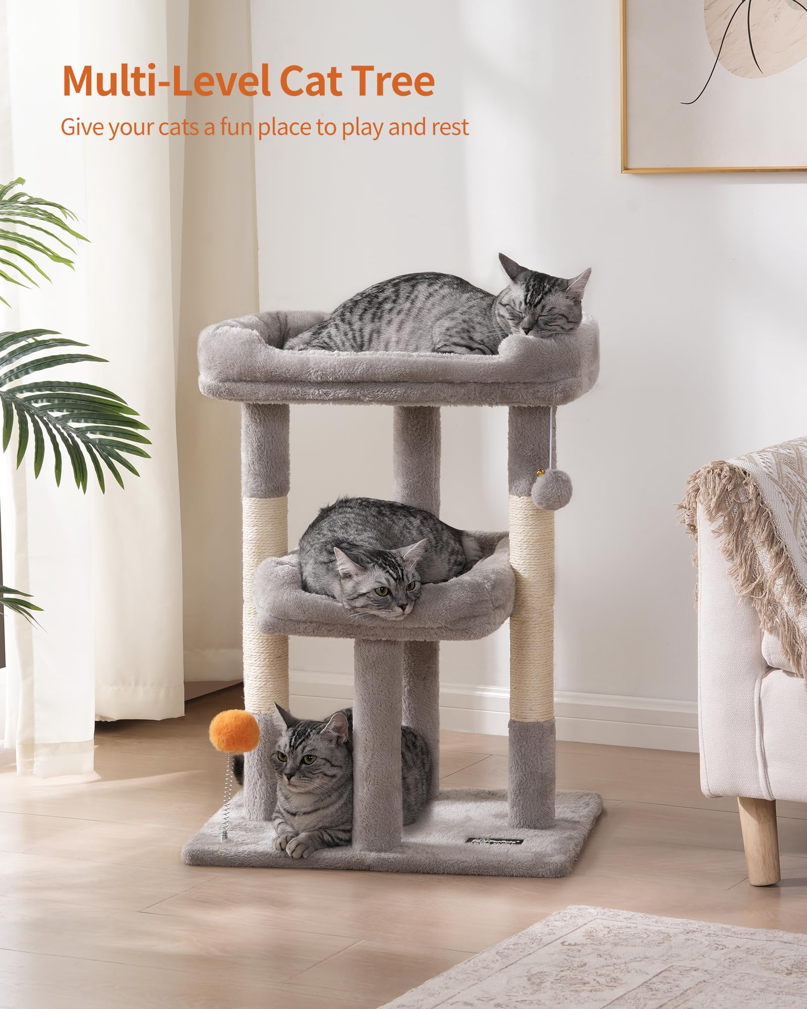FourFurPets cat tree spring loaded ball invites interactive play