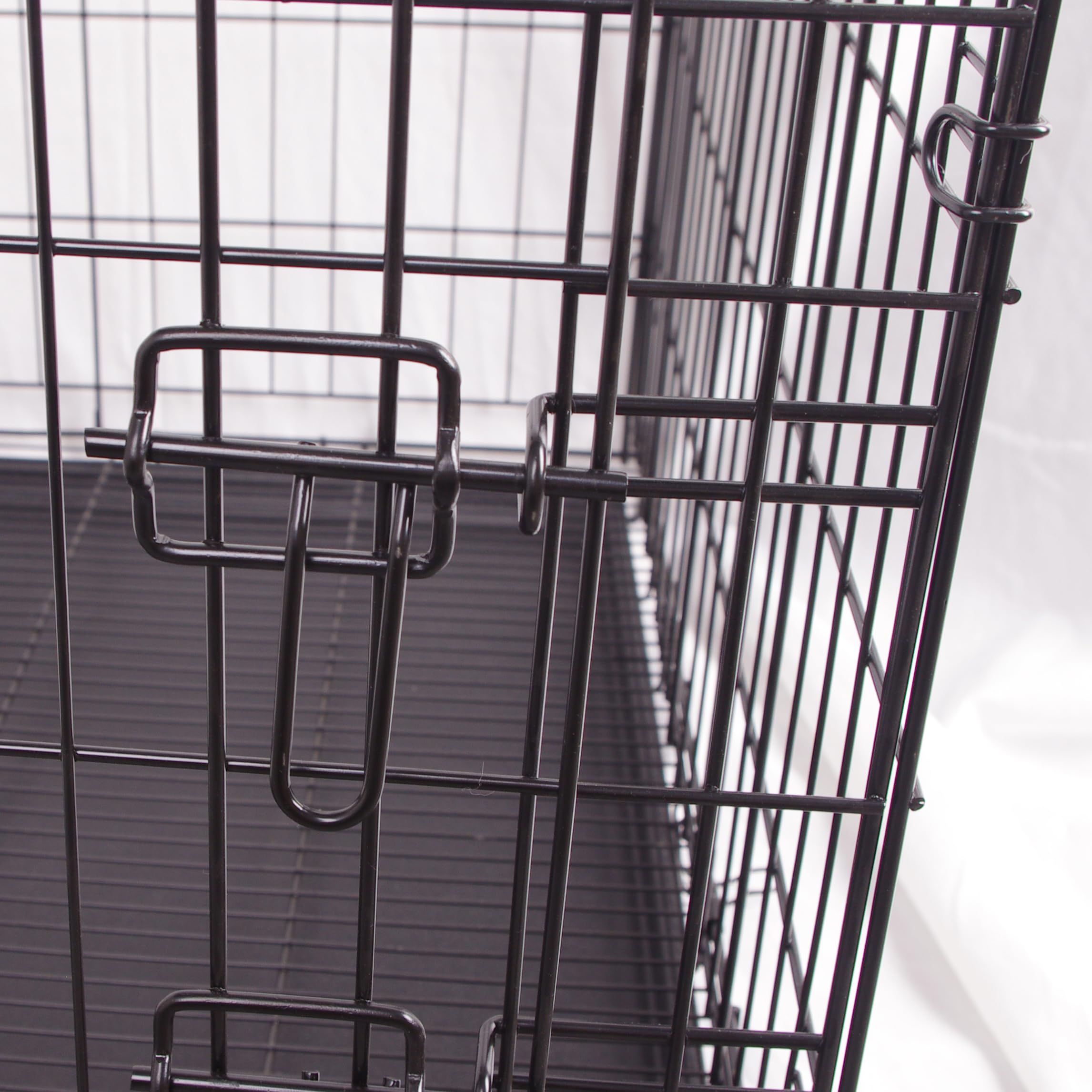 FOURPAW black metal crate complements home décor while keeping pets safe.