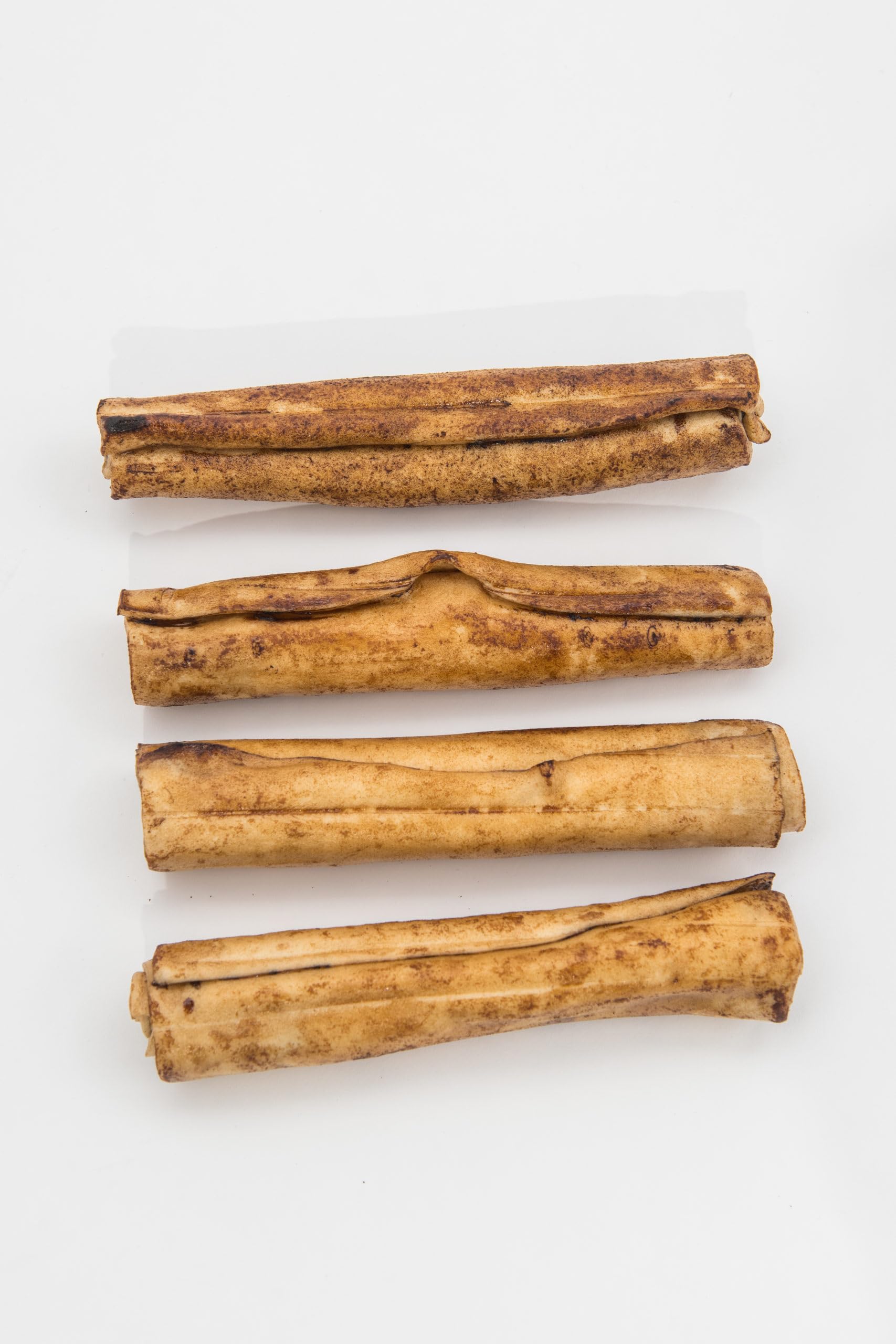Frankly Original beef collagen rolls closeup, showing natural texture for prolonged chewing.