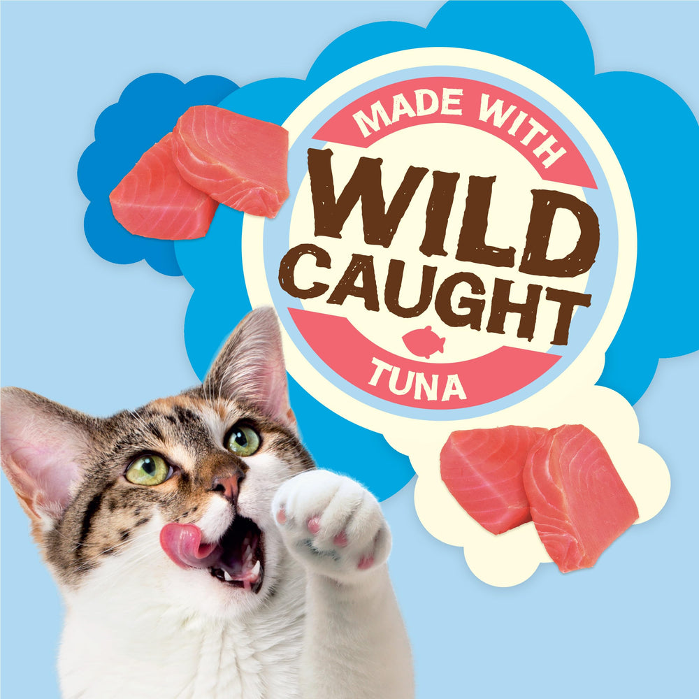 Friskies wild-tuna cat snack close-up showing enticing aroma and bite-sized crunchy bits