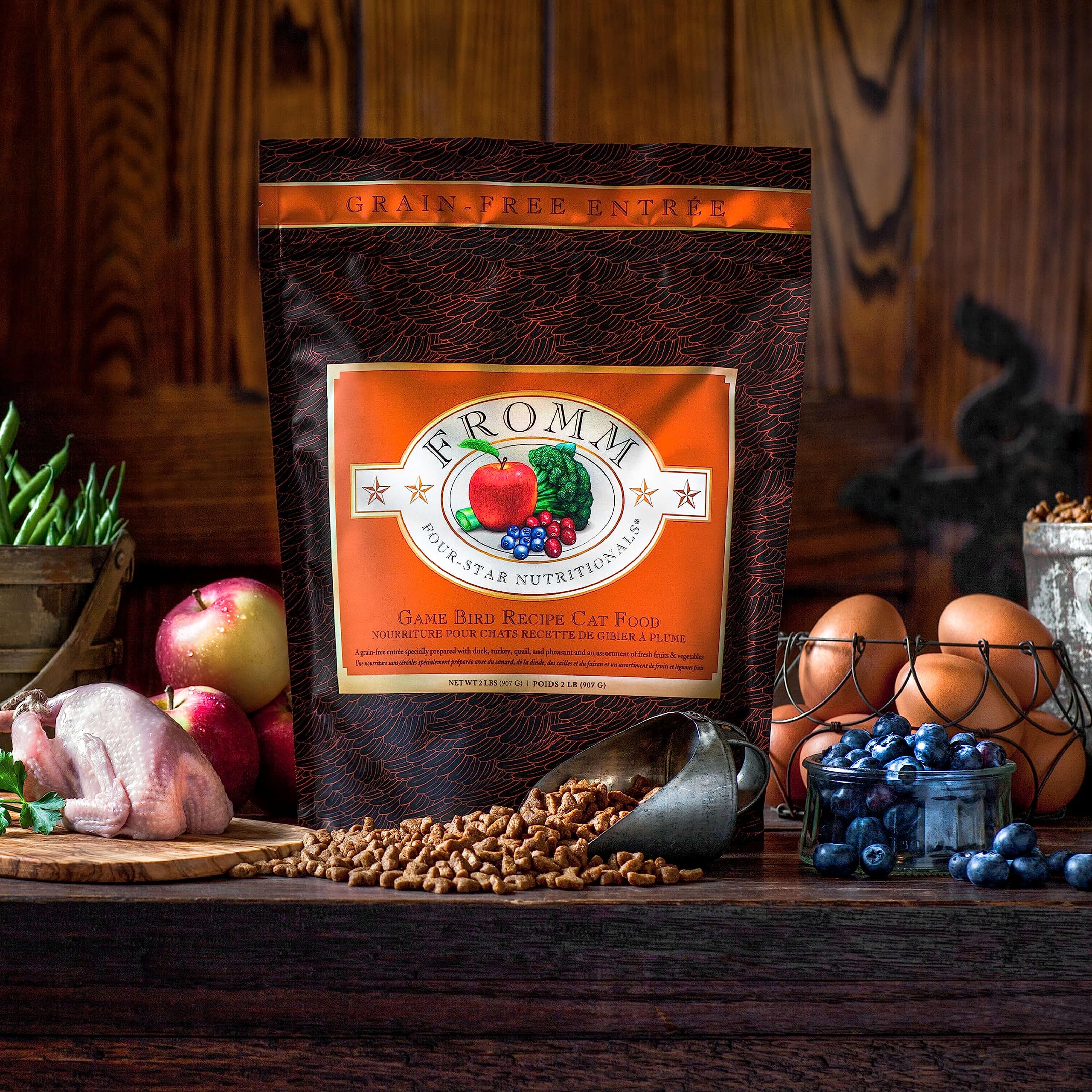 Fromm Four-Star grain-free game bird dry cat food packaging design, appealing to pet parents seeking quality.