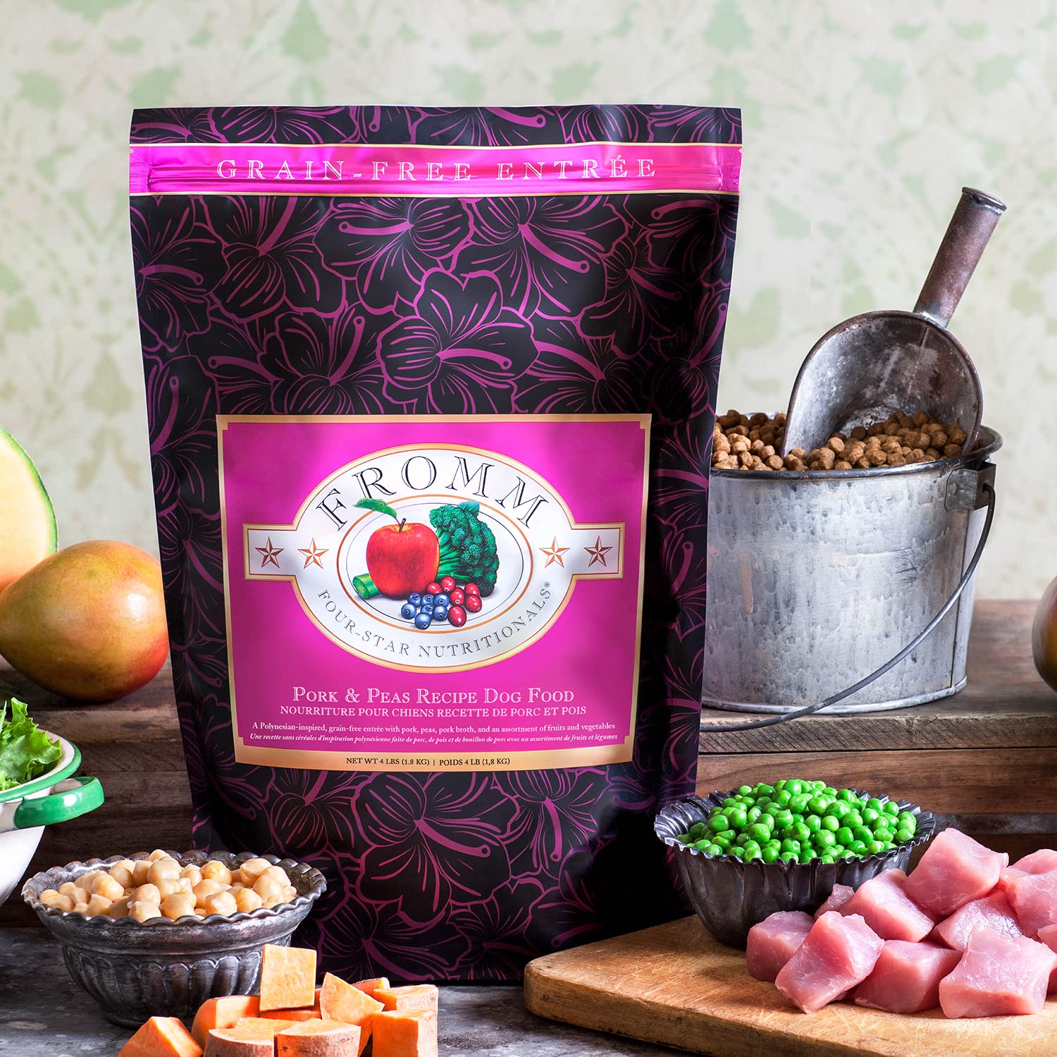 Puppy and adult dogs share Fromm Four-Star meals showing interchangeable variety.