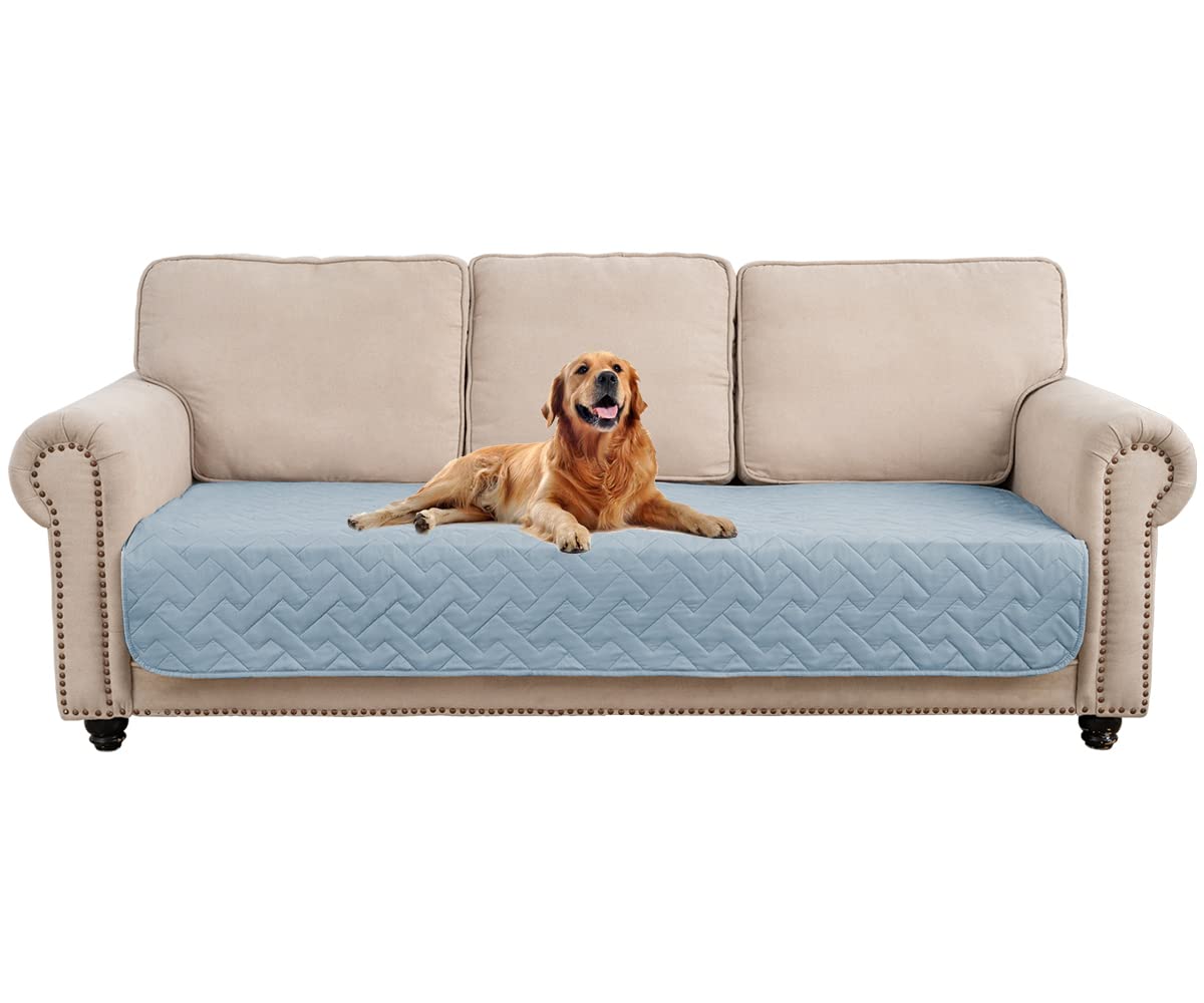 Fuguitex waterproof dog bed cover on sofa protects furniture from spills and slobber.