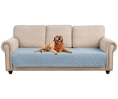Fuguitex waterproof dog bed cover on sofa protects furniture from spills and slobber.