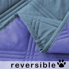 Fuguitex cushion blanket used during crate training shows spill protection and easy cleanup.
