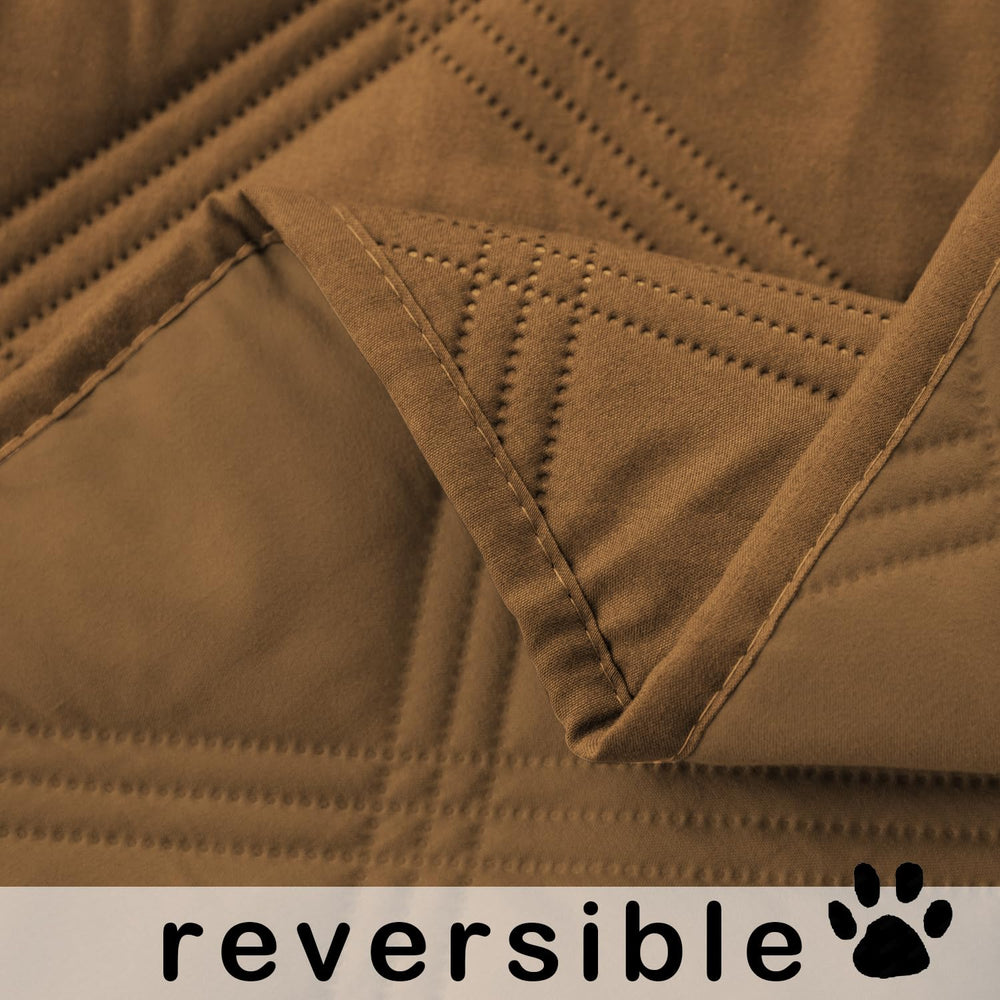 Fuguitex waterproof dog blanket in dog bed creates warm, washable comfort zone